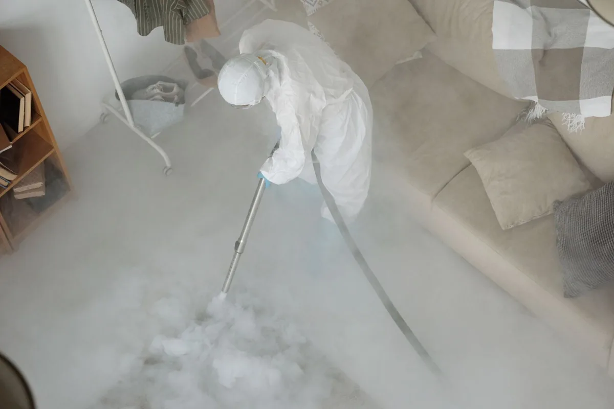 Biohazard cleanup technician in protective equipment, Westbranch, Houston, TX
